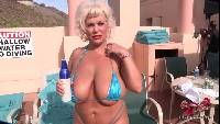 Big tits Claudia-marie on vacation drinking at a pool